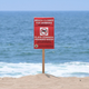A sign indicates that the Dockweiler State Beach is closed to swimming after a sewage spill in Playa del Rey, in Los Angeles County, California.